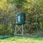 Poplar Combo XT Blind in Forest Green with gun and bow windows set in woods