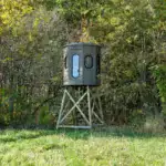 Poplar Combo XT Blind in Tree Trunk color with gun and bow windows set in woods