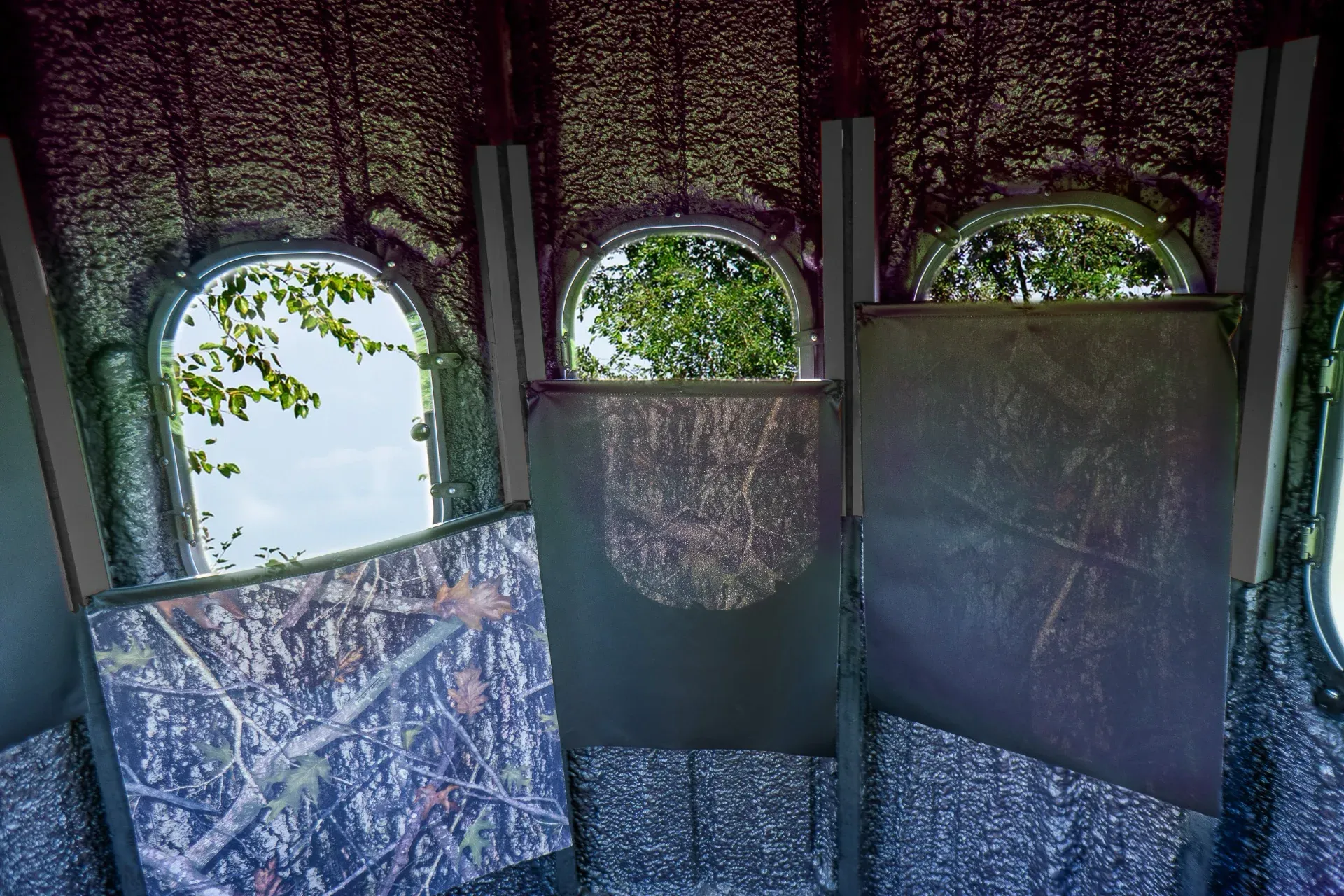 The Ultimate Blind from inside with magnetic curtains partially covering windows at different heights