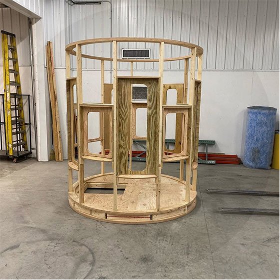 Wood frame hunting blind in warehouse